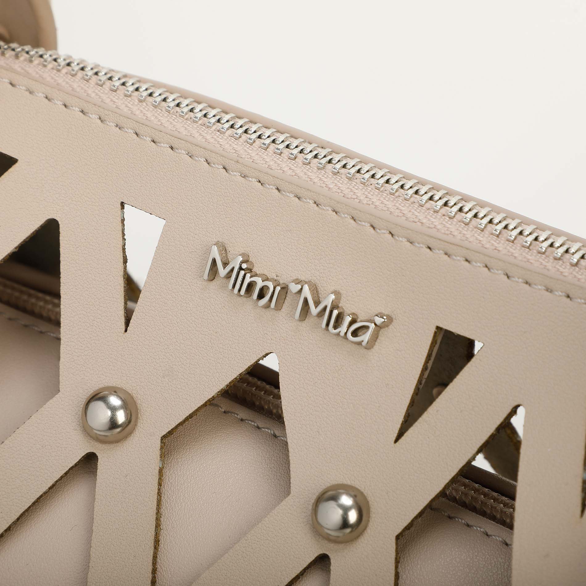 Mimi Mua borsa bauletto effetto rete con borchie