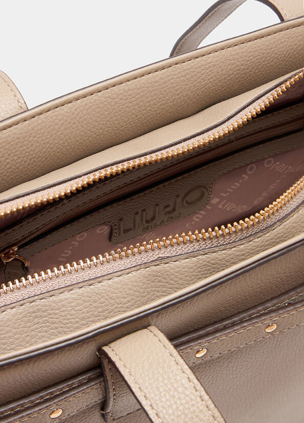 Shopper Liu Jo elegante con doppi manici e borchie decorative