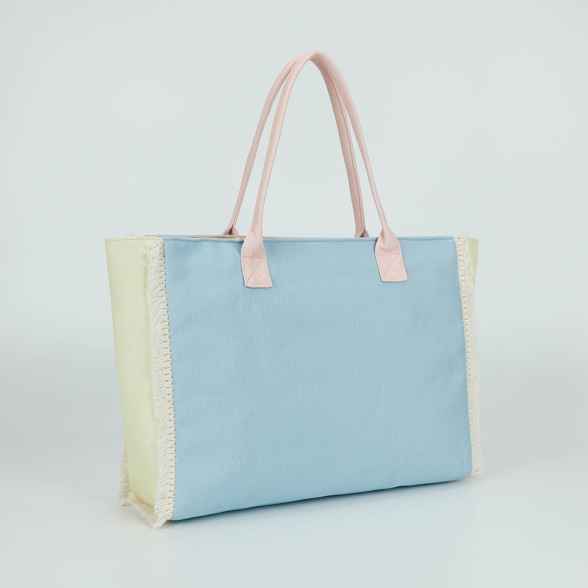 Mimi Mua borsa shopper in tessuto con frange e scritta