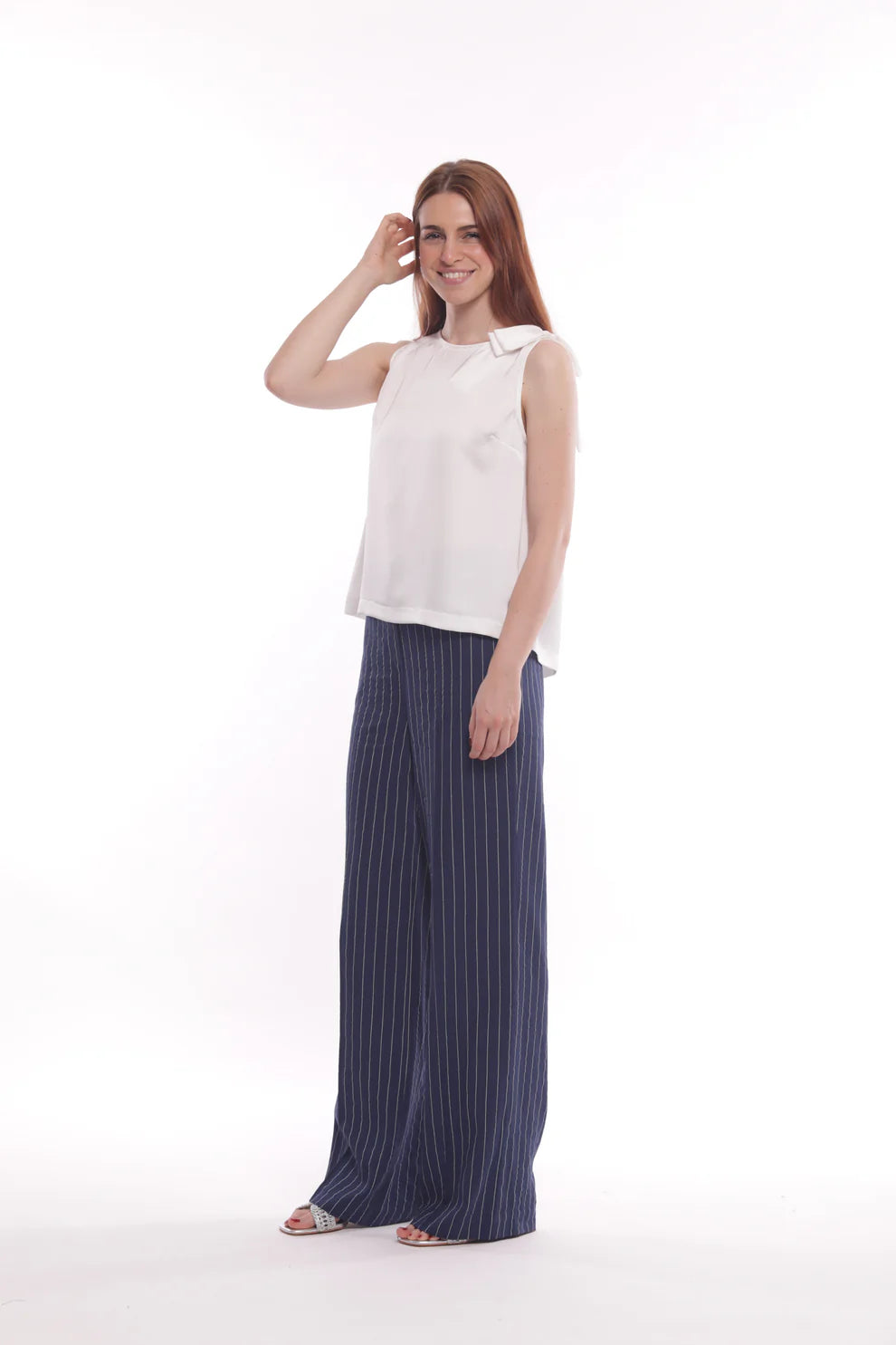 Pantaloni donna a palazzo con fantasia rigata
