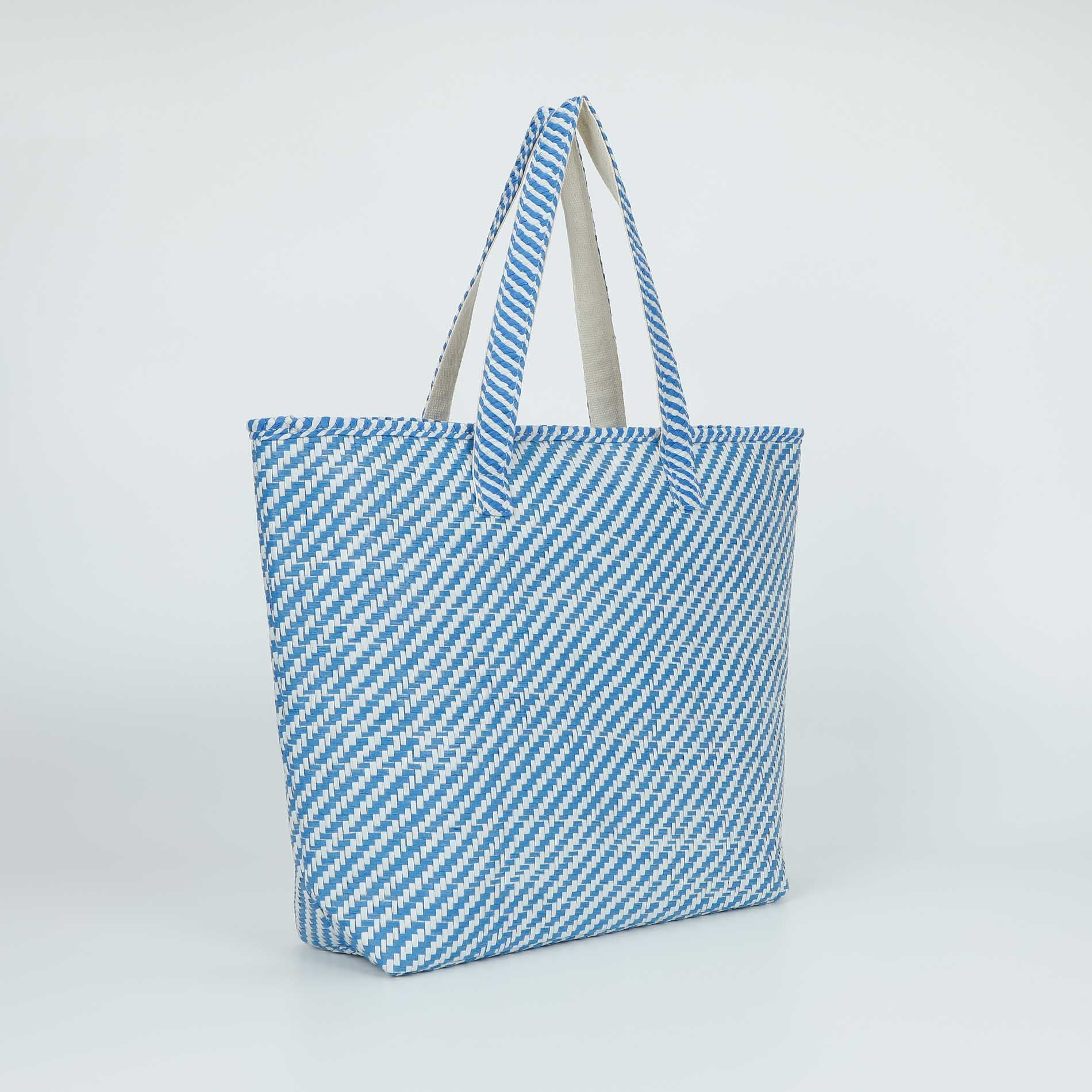 Mimi Mua borsa shopper a righe in paglia intrecciata