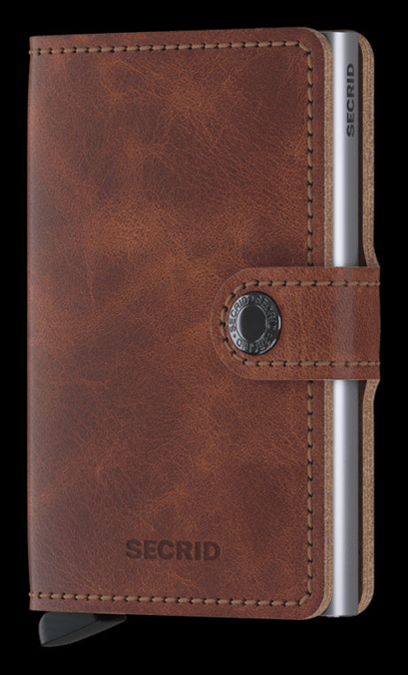 Portafoglio Secrid Miniwallet in pelle con protezione RFID e chiusura a bottone