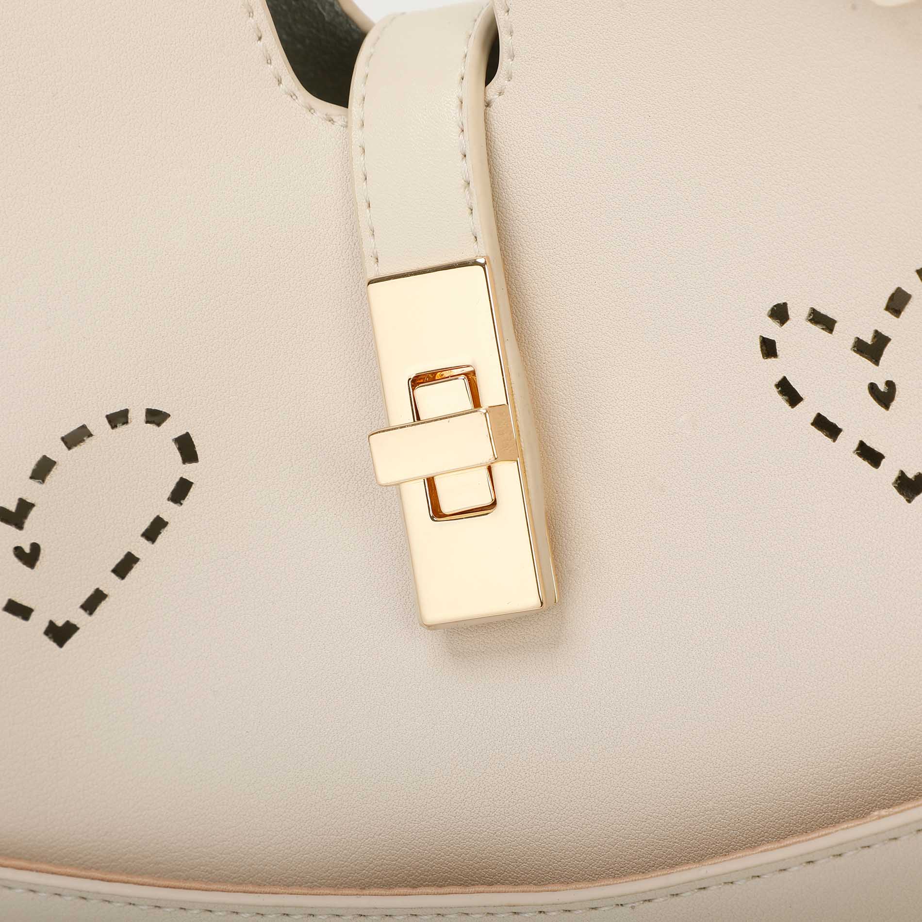 Mimi Mua borsa shopping con cuore traforato