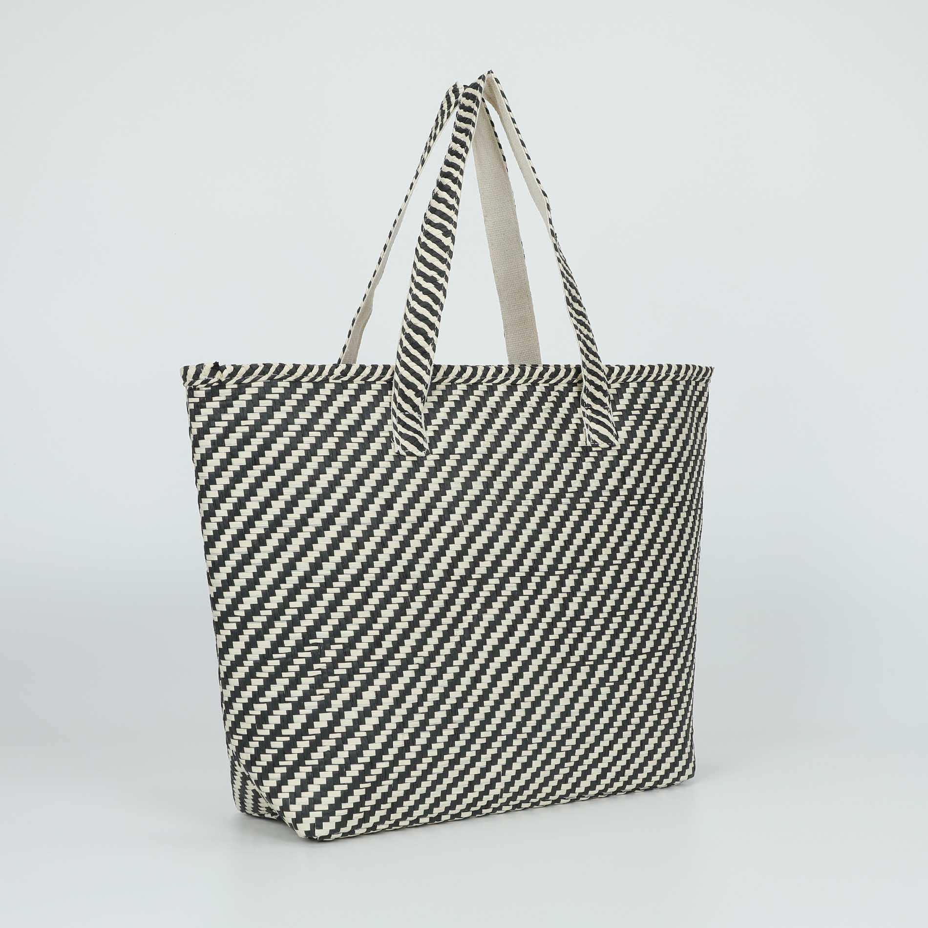 Mimi Mua borsa shopper a righe in paglia intrecciata