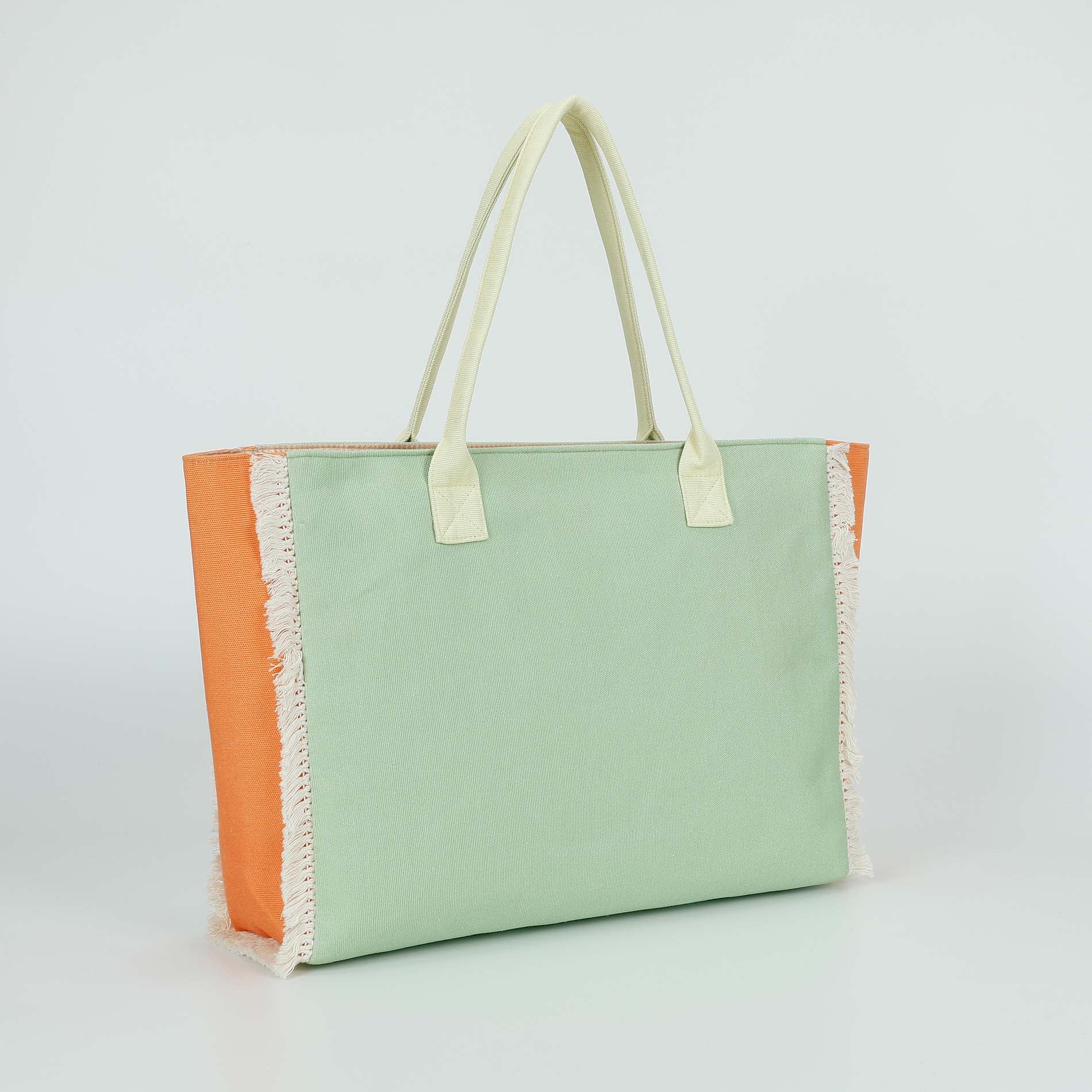 Mimi Mua borsa shopper in tessuto con frange e scritta