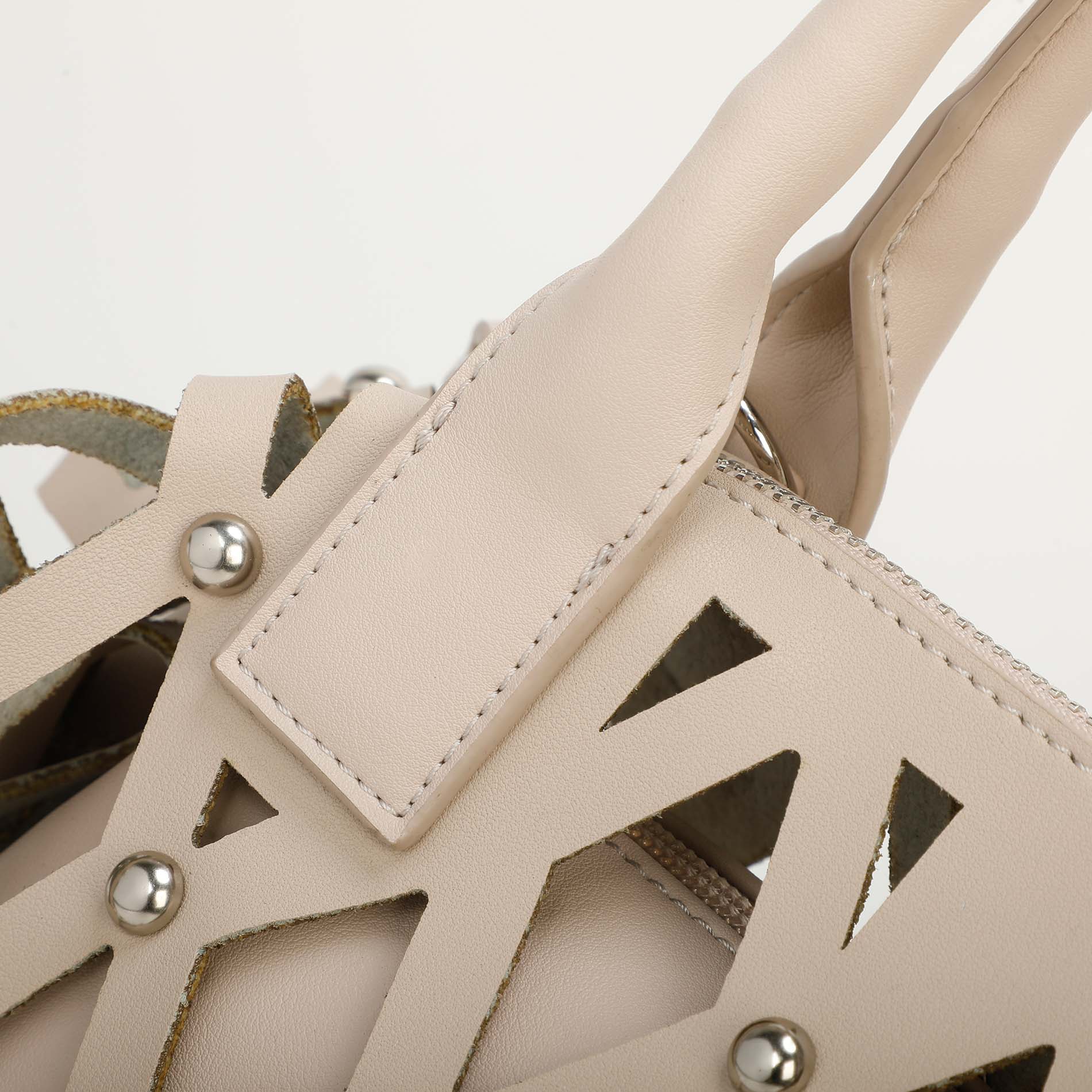 Mimi Mua borsa bauletto effetto rete con borchie
