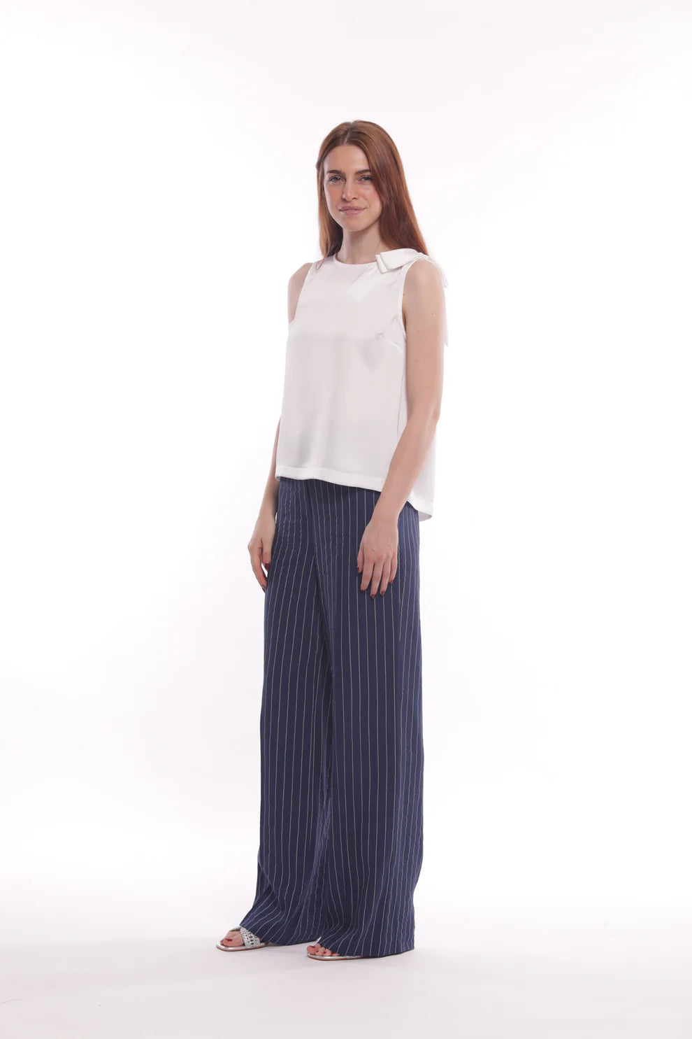 Pantaloni donna a palazzo con fantasia rigata