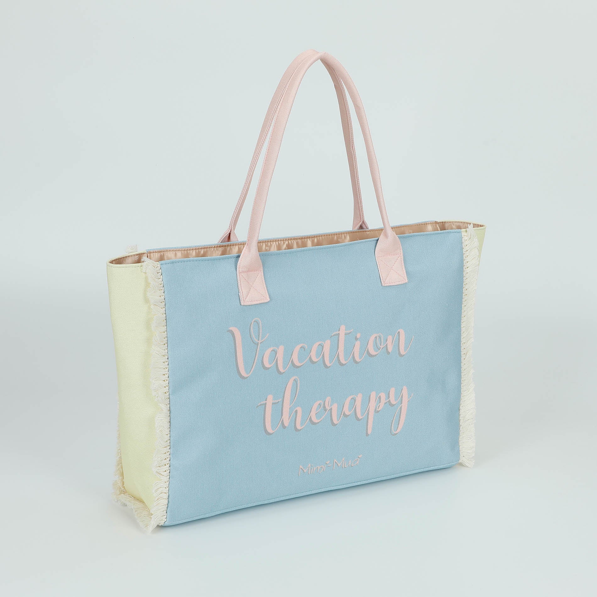Mimi Mua borsa shopper in tessuto con frange e scritta