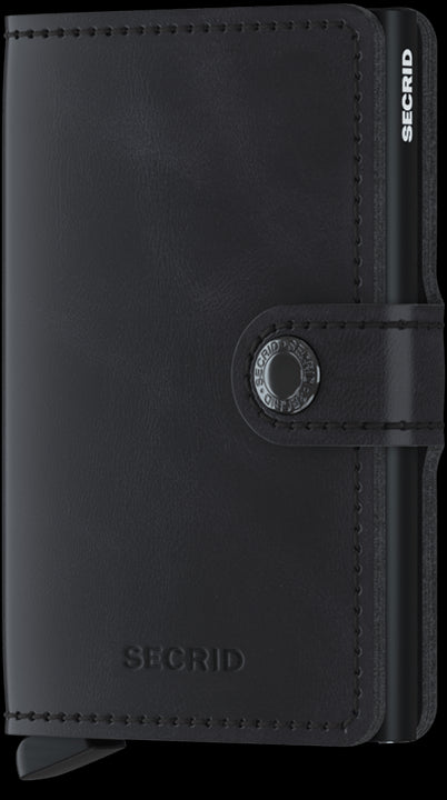 Portafoglio Secrid Miniwallet in pelle con protezione RFID e chiusura a bottone