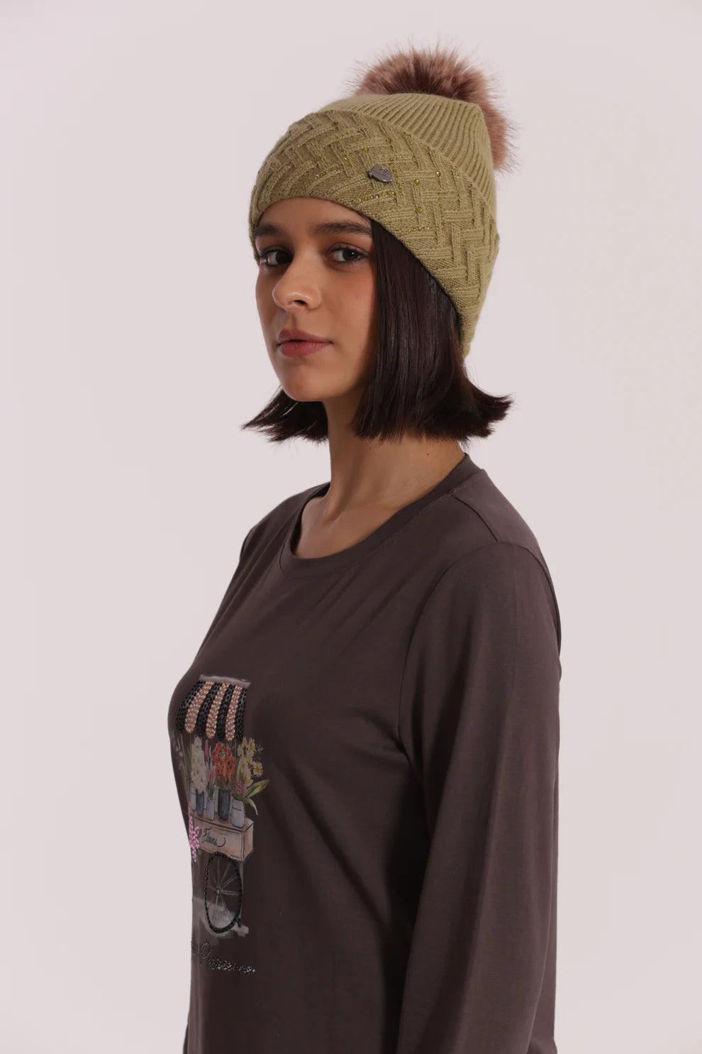 Cappello donna Mimi Mua con pon pon e lavorazione a trecce