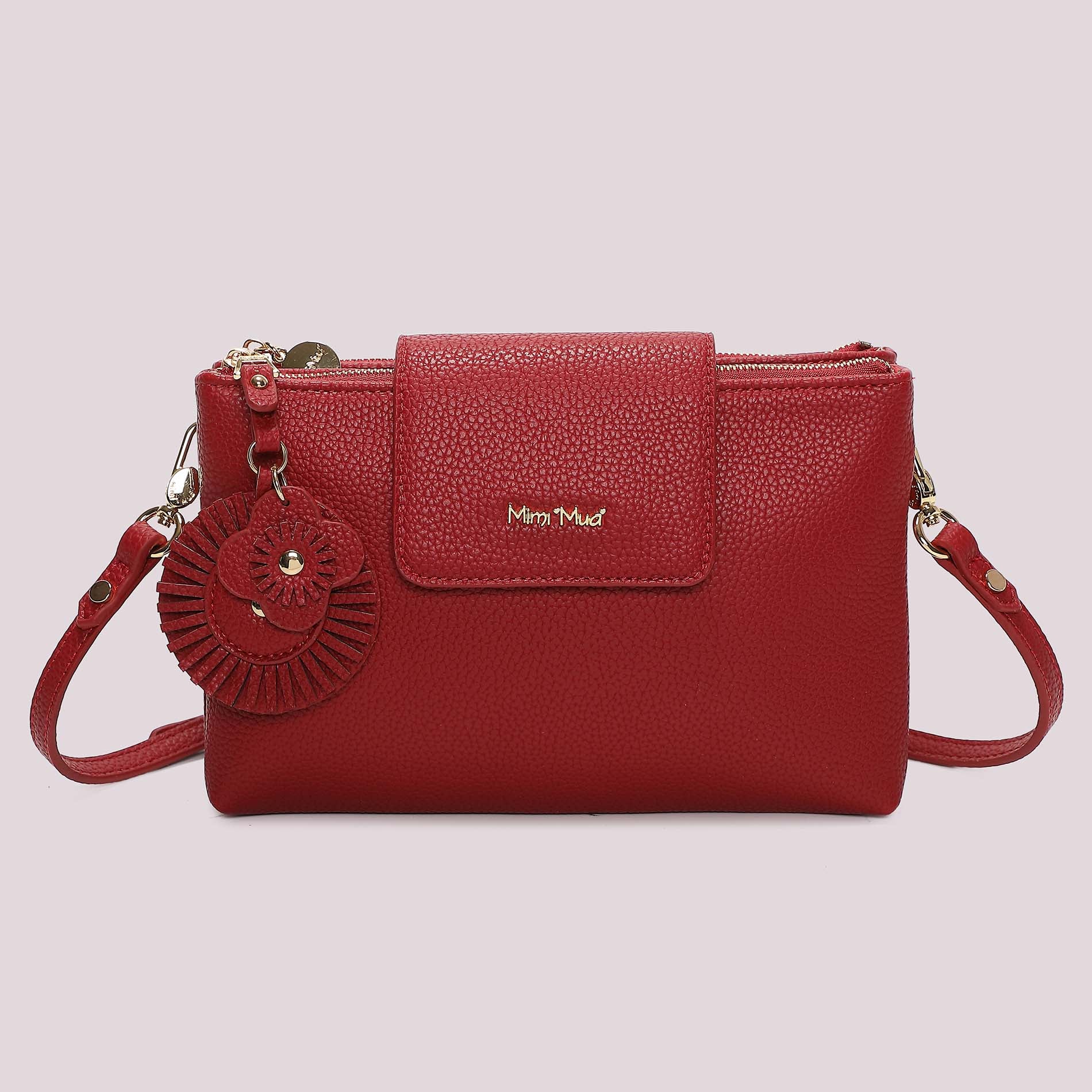 Borsa a tracolla donna rossa Mimi Mua con patta e charm floreale Rosso TU | Giò Fashion