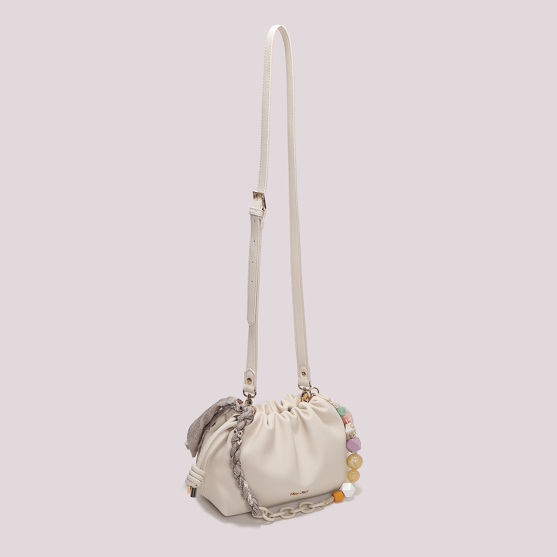 Borsa tracolla Mimi Mua morbida con chiusura a coulisse e dettagli decorativi