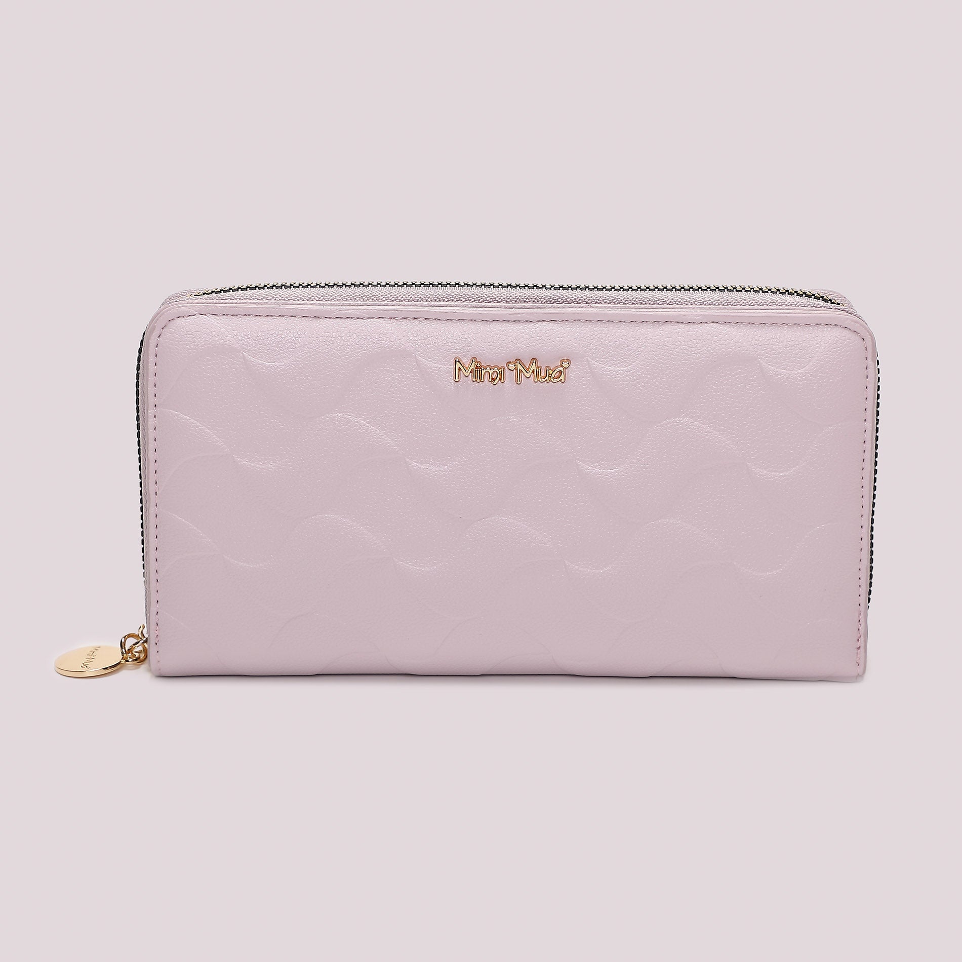 Portafoglio donna Mimi Mua grande zip around con motivo trapuntato elegante Lilla TU | Giò Fashion