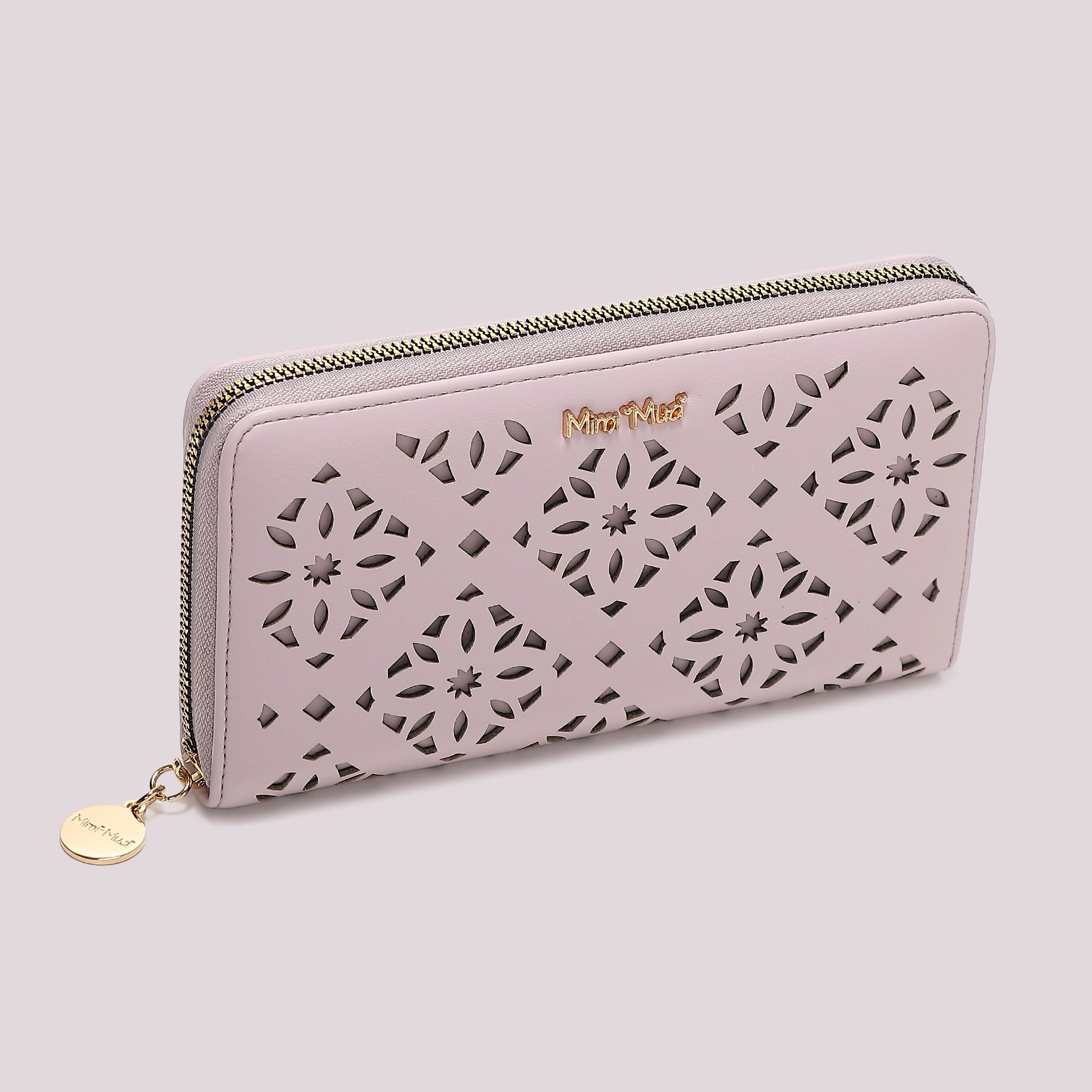 Portafoglio donna Mimi Mua zip around grande traforato con motivo elegante Lilla TU | Giò Fashion