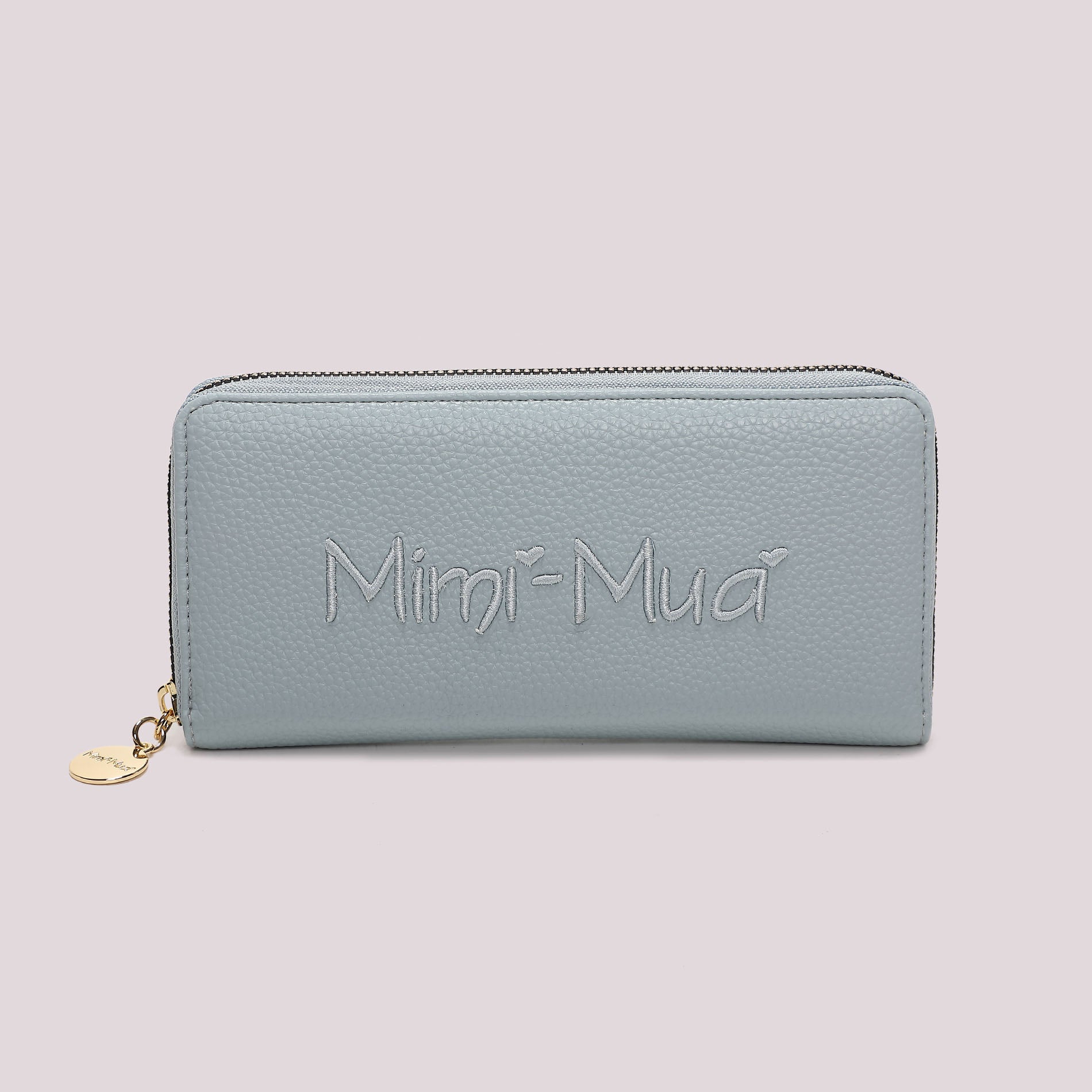 Portafoglio donna Mimi Mua grande zip around con logo in rilievo elegante CELESTE TU | Giò Fashion