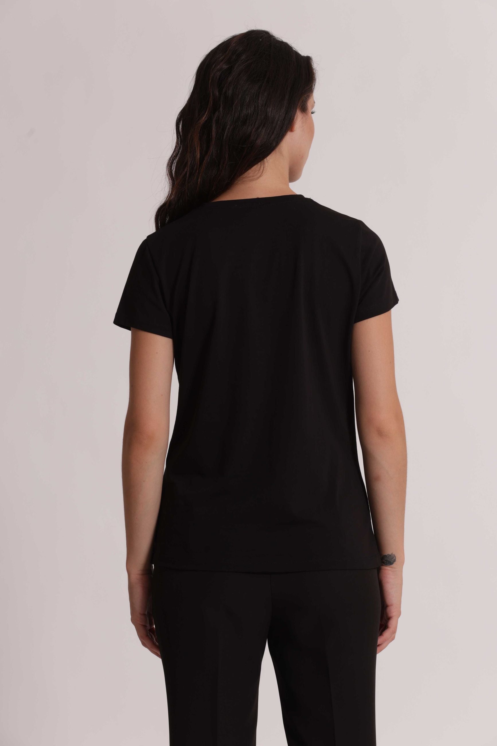 T shirt donna con dettaglio laterale e design minimal raffinato Nero S | Giò Fashion