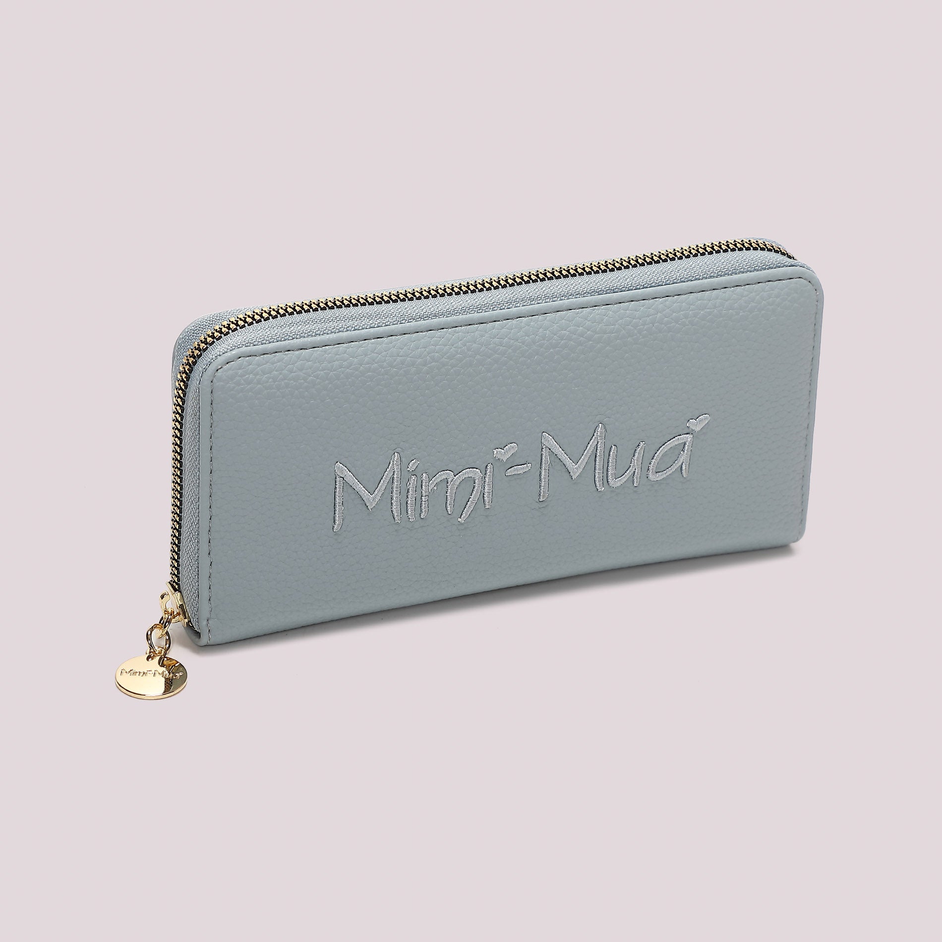 Portafoglio donna Mimi Mua grande zip around con logo in rilievo elegante CELESTE TU | Giò Fashion