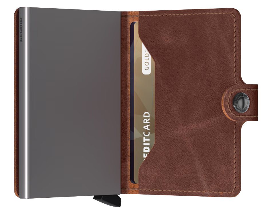 Portafoglio Secrid Miniwallet in pelle con protezione RFID e chiusura a bottone