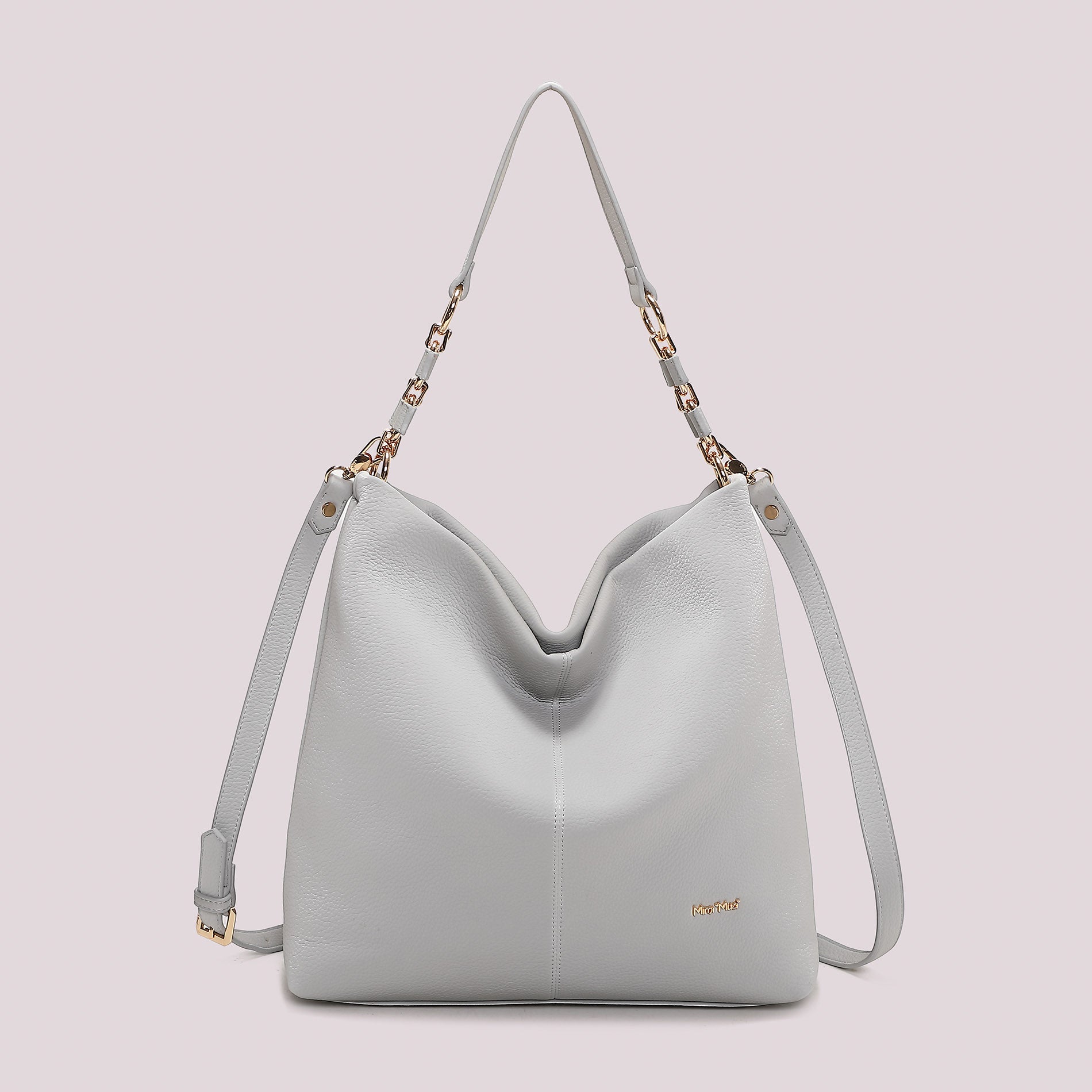 Borsa a spalla Mimi Mua elegante con doppio manico e dettaglio catena